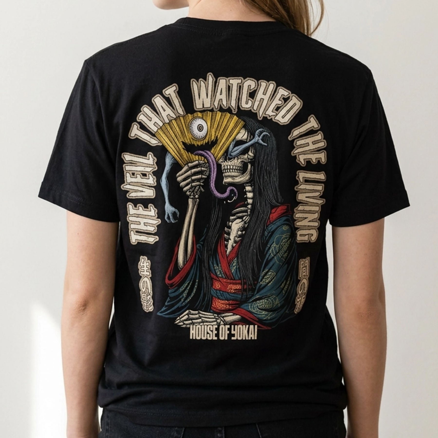 The Veil That Watched The Living Tee